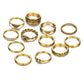 Collection of gold rings on a white background