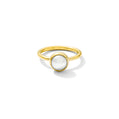 Gold ring with a white gemstone on a white background