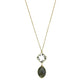 Necklace with a pendant featuring a green stone on a white background