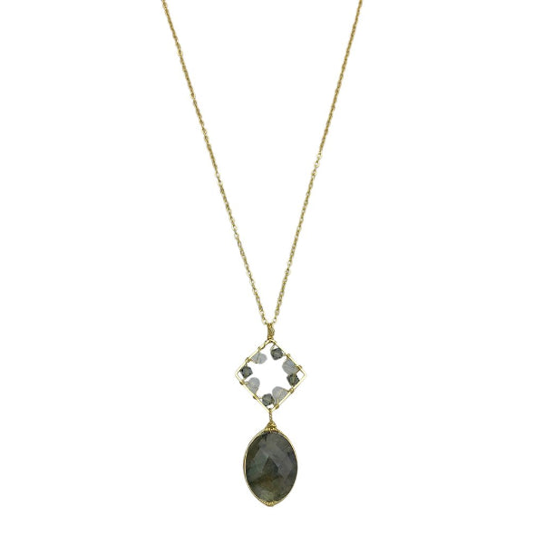 Necklace with a pendant featuring a green stone on a white background