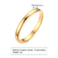 Gold ring with thickness measurement and material details on a white background