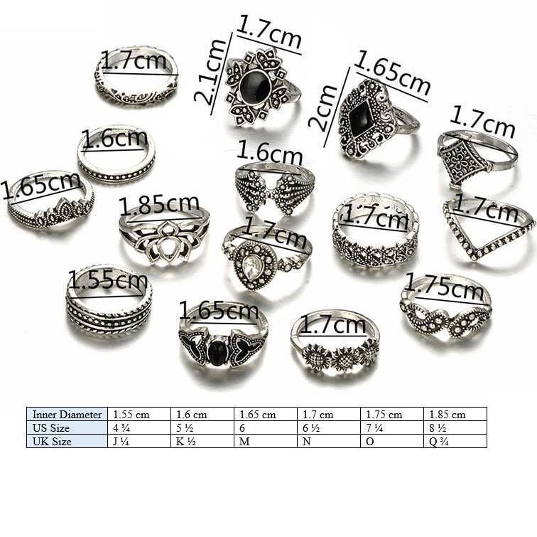 Set of silver rings with measurements and size chart on a white background