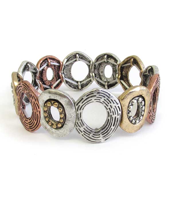 Multicolored bracelet with circular patterns on a white background