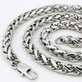 Silver chain necklace on a white background