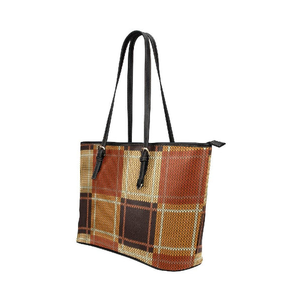 Plaid patterned handbag with brown and beige colors on a white background